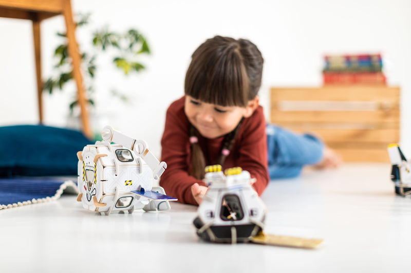 Child playing with the Playpress Space Station